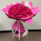 100 Roses and orchids Signature handheld bouquet