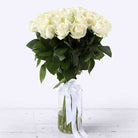 25 Long Stem white roses in a vase